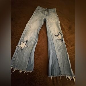 Levi’s 505 Distressed Star Patch Jeans
